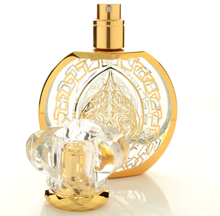 شیشه عطر 50 میل پیچی عربی گرد طلاکوب کد 173